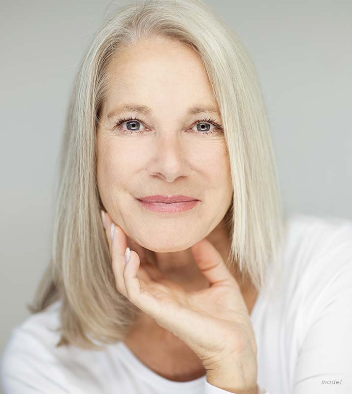 headshot of middle aged female model