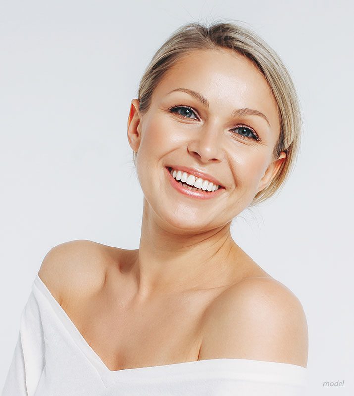 Headshot of happy female model 