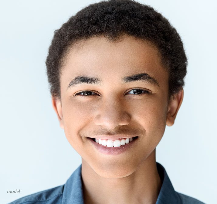 Headshot of a young smiling boy